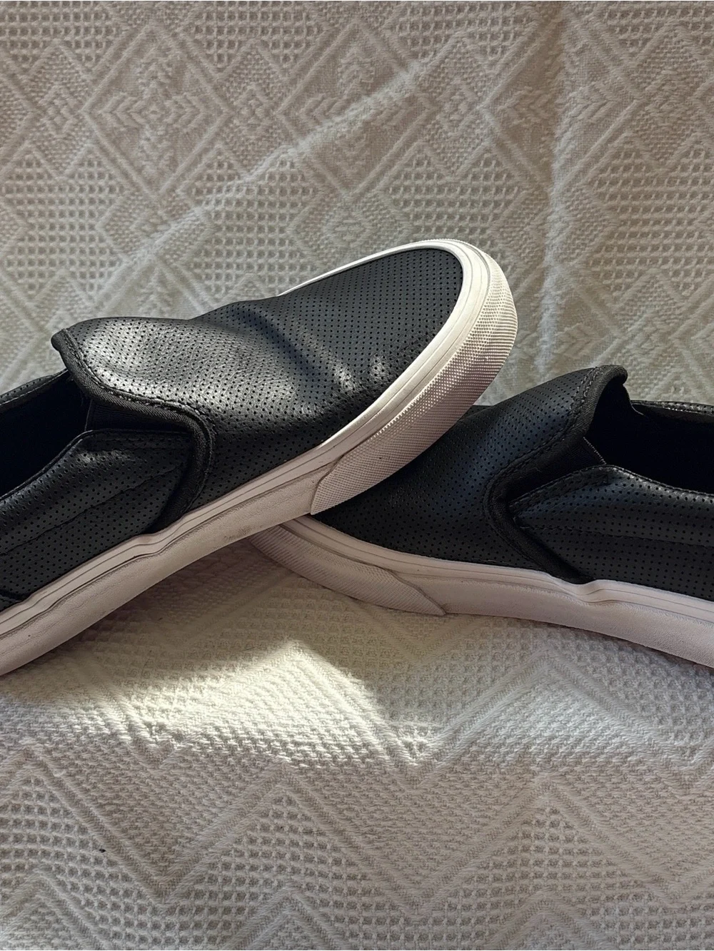 Vans Black Perforated Slip-On Sneakers with White Sole